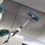 Cleaning Panel in Cleanroom with Extended Mop Handles